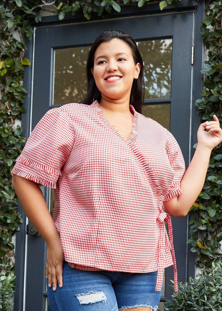 Plus Size Fringe Trim Gingham Wrap Blouse in Red Gingham