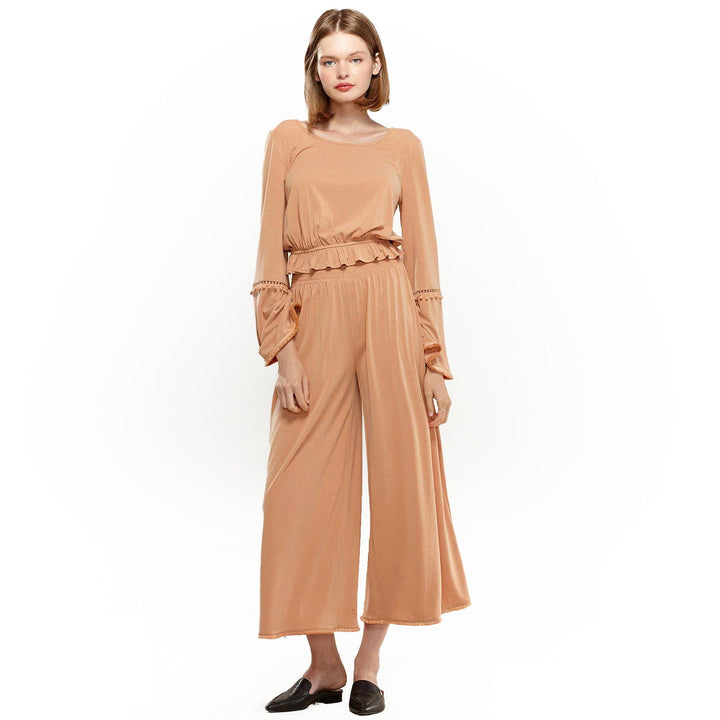 Smocked Waist Wide Leg Palazzo Pants in Apricot by Shop at Konus