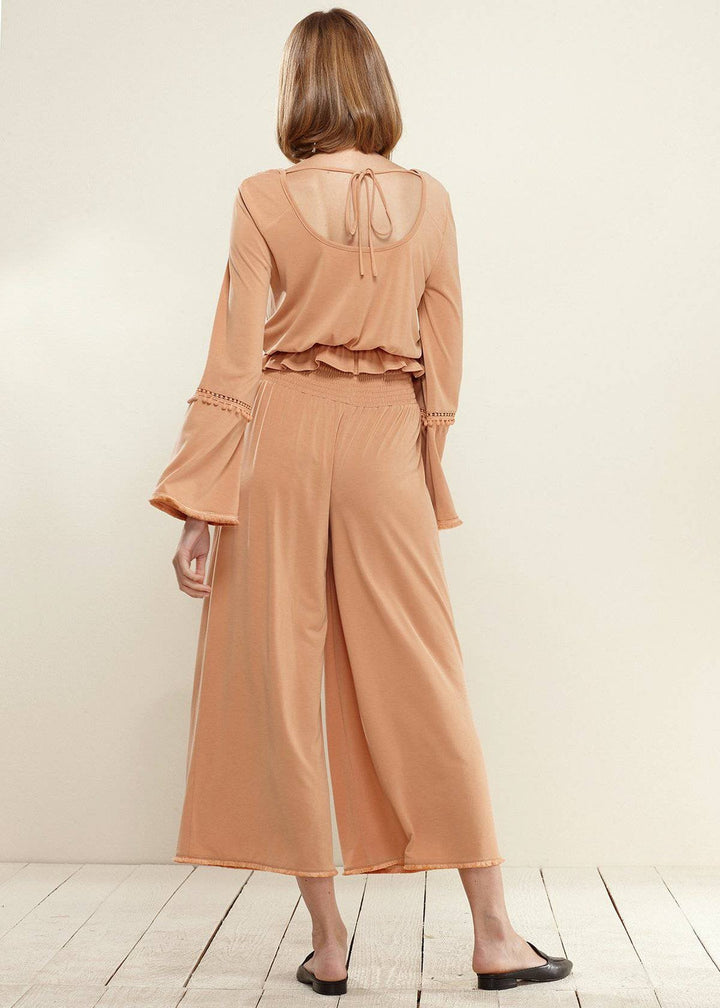 Smocked Waist Wide Leg Palazzo Pants in Apricot by Shop at Konus