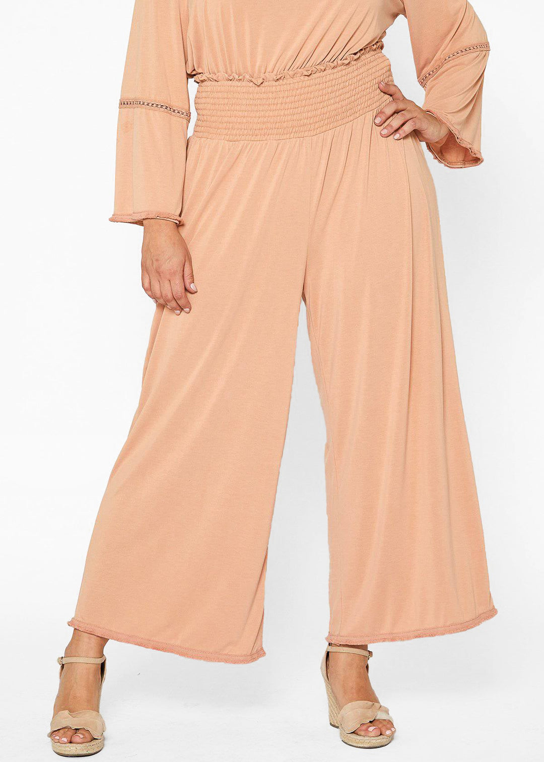 Plus Size Smocked Waist Wide Leg Palazzo Pants in Apricot by Shop at Konus