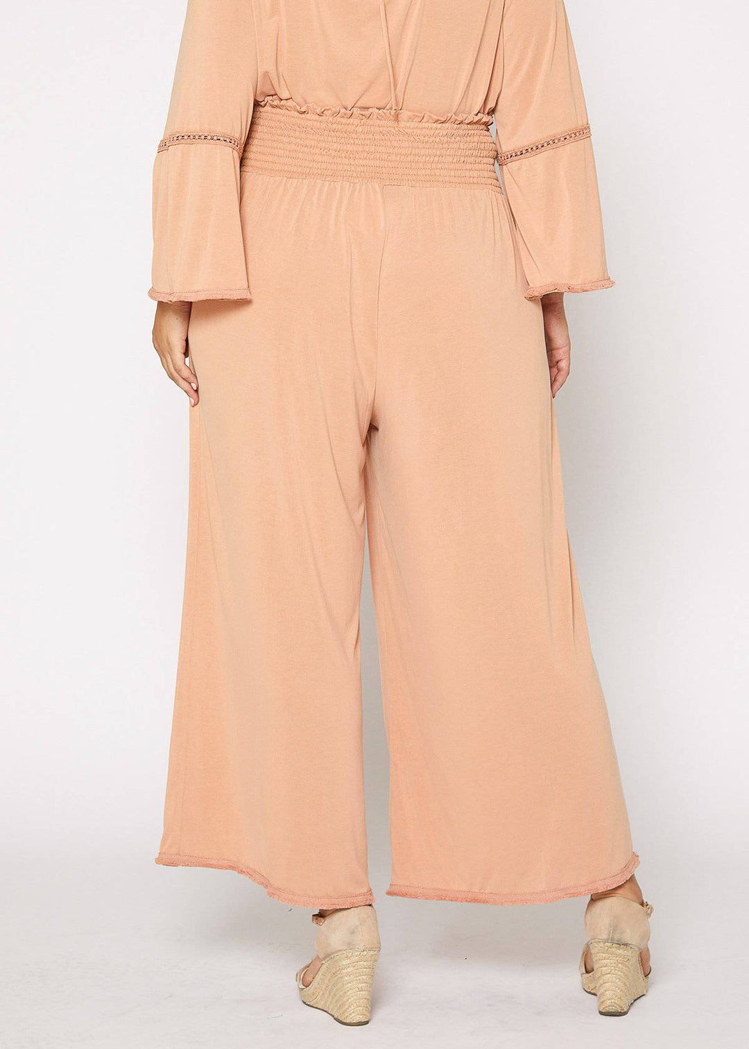 Plus Size Smocked Waist Wide Leg Palazzo Pants in Apricot by Shop at Konus