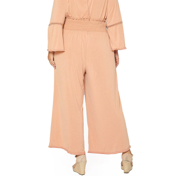 Plus Size Smocked Waist Wide Leg Palazzo Pants in Apricot by Shop at Konus