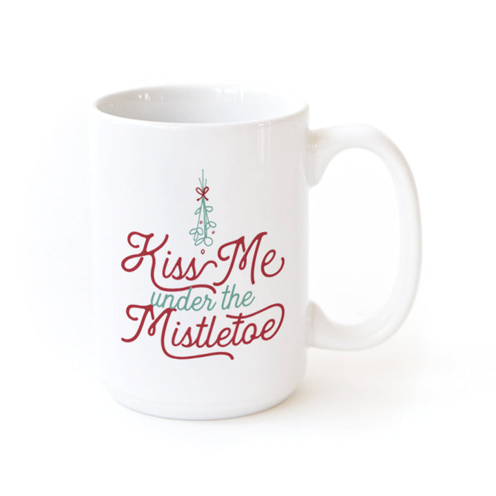 Kiss Me Under the Mistletoe Coffee Mug by The Cotton & Canvas Co.