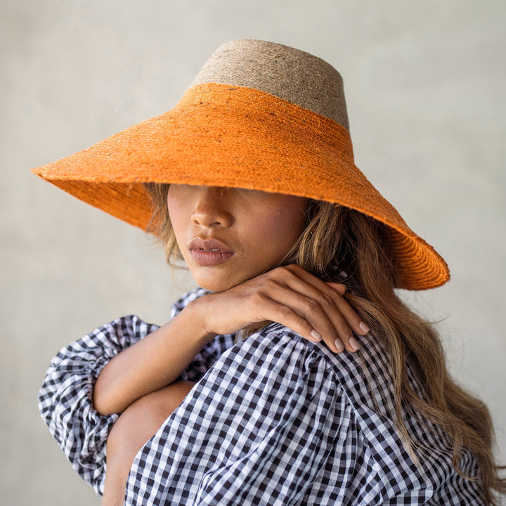 RIRI Duo Jute Handwoven Straw Hat In Pumpkin Orange by BrunnaCo