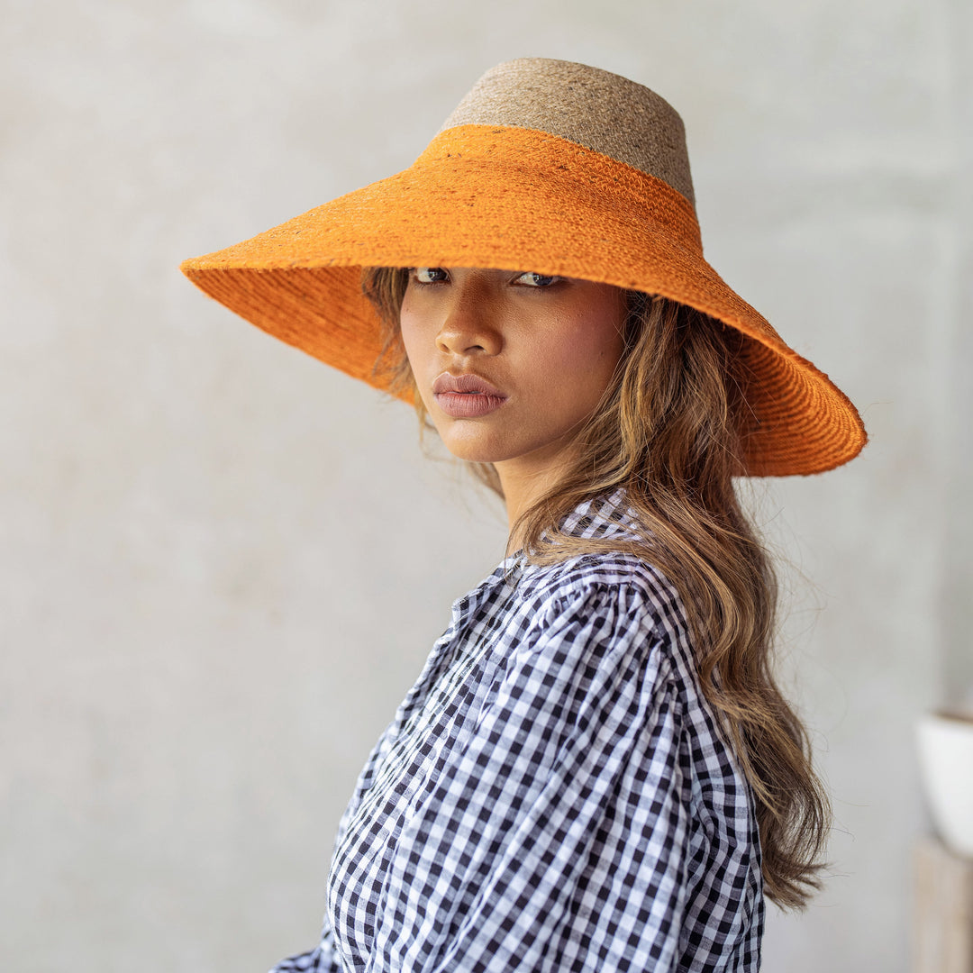 RIRI Duo Jute Handwoven Straw Hat In Pumpkin Orange by BrunnaCo