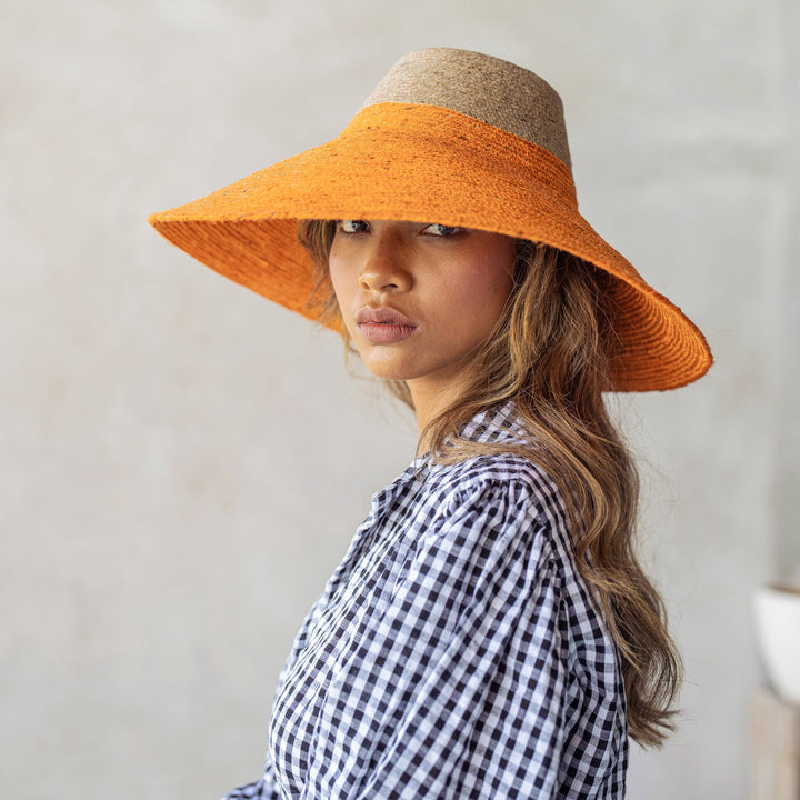 RIRI Duo Jute Handwoven Straw Hat In Pumpkin Orange by BrunnaCo